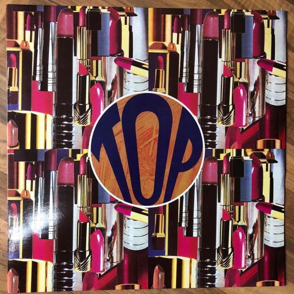 Top - She's Got All The World